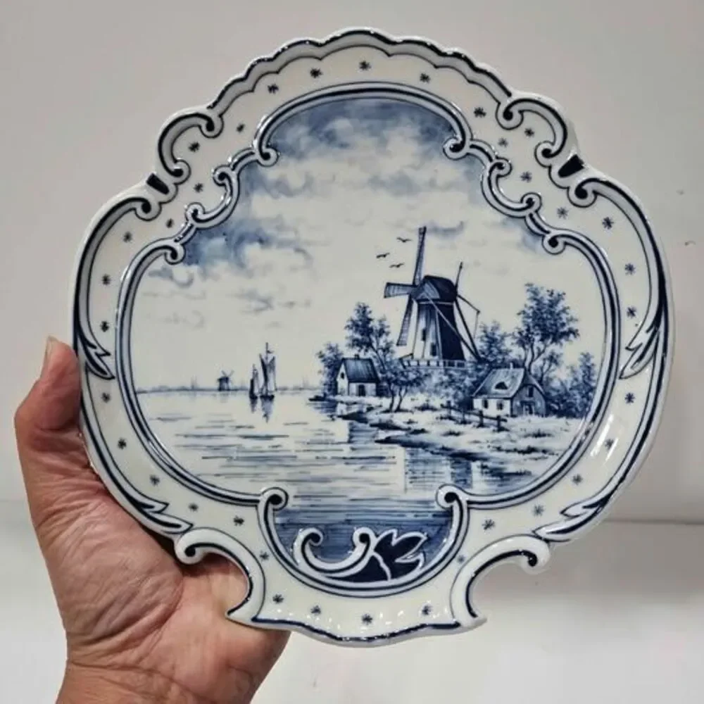 Blue and white windmill decorative plate